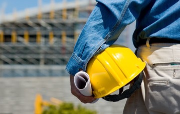 A construction worker or foreman at a construction site